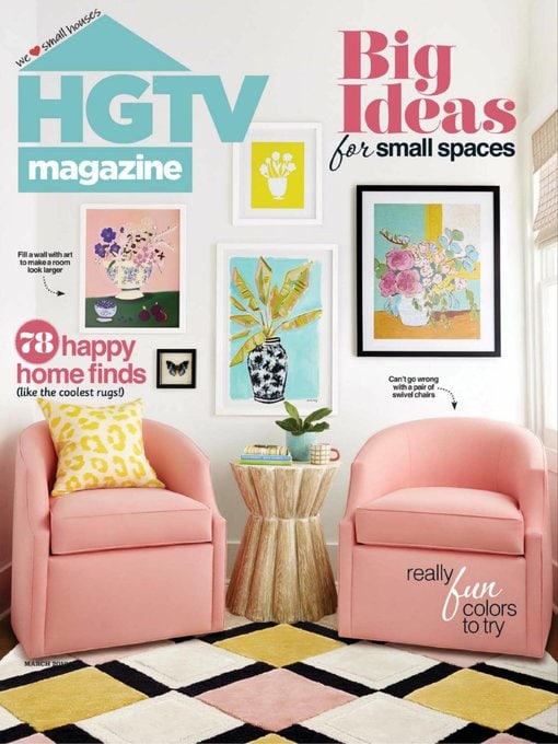 Cover of HGTV Magazine featuring two pink armchairs, a wooden side table, colorful framed art, and a geometric rug with text about home decor ideas for small spaces.