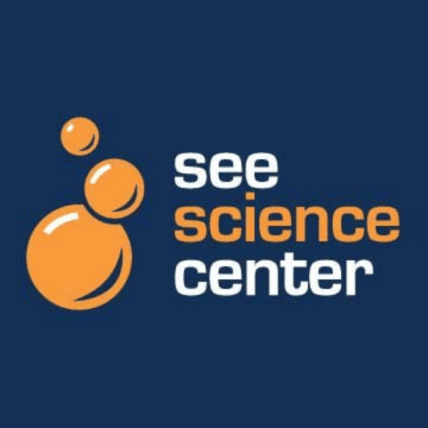 Logo for SEE Science Center featuring three orange bubbles and the text