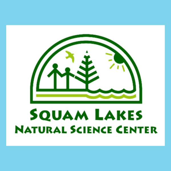 Logo of Squam Lakes Natural Science Center featuring two figures, a tree, a flying bird, water waves, and a sun within a green arch on a blue background.
